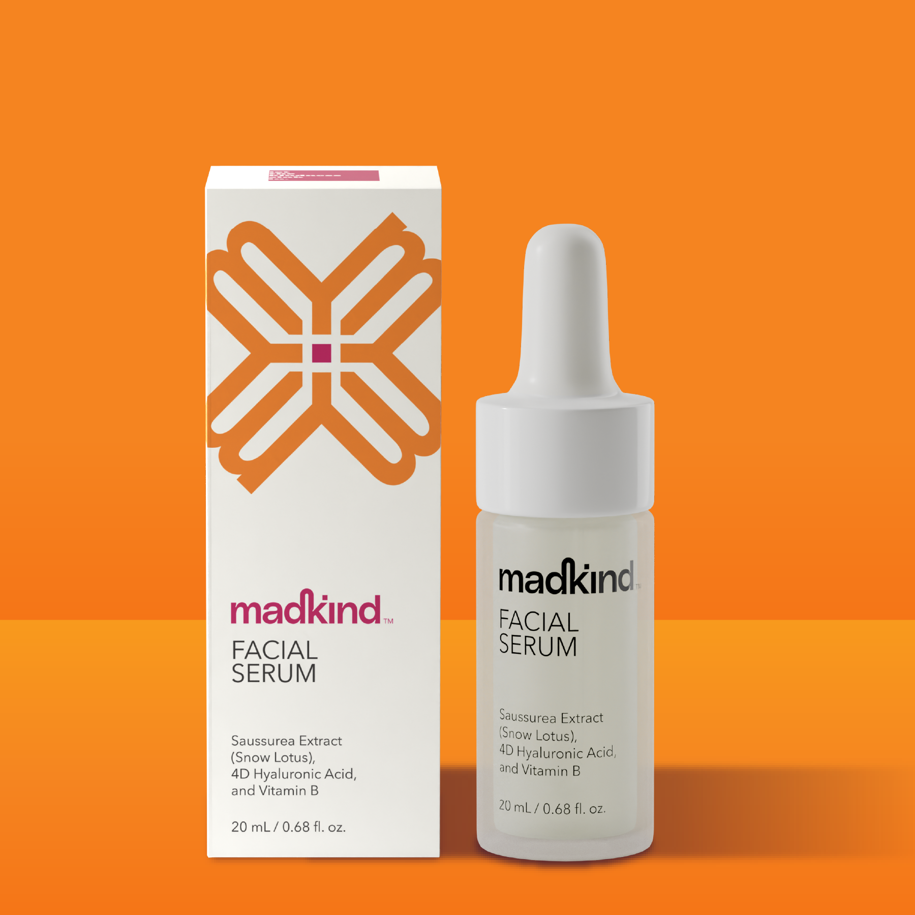 Madkind facial serum bottle and packaging on an orange background